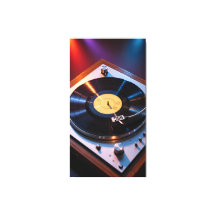 Vintage vinyl records spinning under colored light