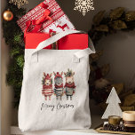 Vintage Watercolor Christmas Animals Tote Bag<br><div class="desc">Transform your holiday designs into a cozy winter wonderland with these vintage watercolor Christmas animals! These high-resolution PNG illustrations come with transparent backgrounds, making them the perfect addition to your festive projectsGet ready to infuse the holiday spirit into your products, especially if you're selling on Zazzle. Our collection features anthropomorphic...</div>