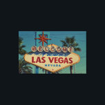 Vintage Welcome To Las Vegas Wall Art<br><div class="desc">This canvas print showcases a vintage sign plus the words "Welcome To Fabulous Las Vegas Nevada" with palm trees in the background under a clear blue sky in this vintage & classic art style and theme. Our prints are printed with the highest resolution on cotton-poly archival paper, for a long-lasting...</div>