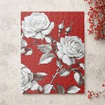 Vintage White Rose Jigsaw Puzzle<br><div class="desc">This jigsaw puzzle features beautiful vintage-inspired soft white roses and trailing leaves on a rich crimson red backdrop. The classic floral motif is both timeless and bold—romantic with a hint of drama. This pretty puzzle is ideal for anyone who loves gardening,  flowers,  nature,  or piecing together puzzles.</div>