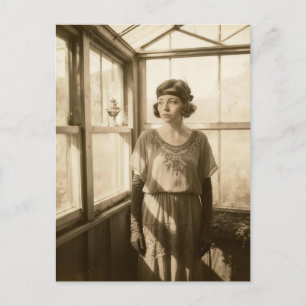 Vintage woman in a greenhouse sepia photo postcard