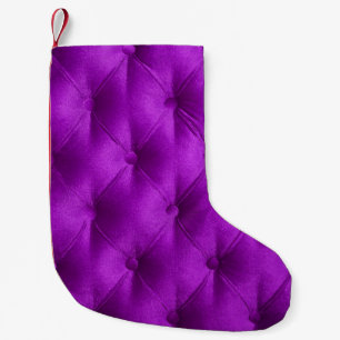 Violet purple velvet capitone textile background,  small christmas stocking