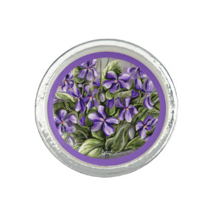 Violettes in a moon jar ring