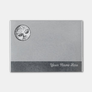 Visage de lune sur la note de post-it grise