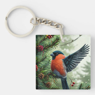 Vivid Bullfinch Perched on a Snowy Branch Keychain