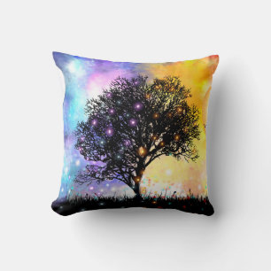 Vivid surreal sunset with black silhouette tree throw pillow