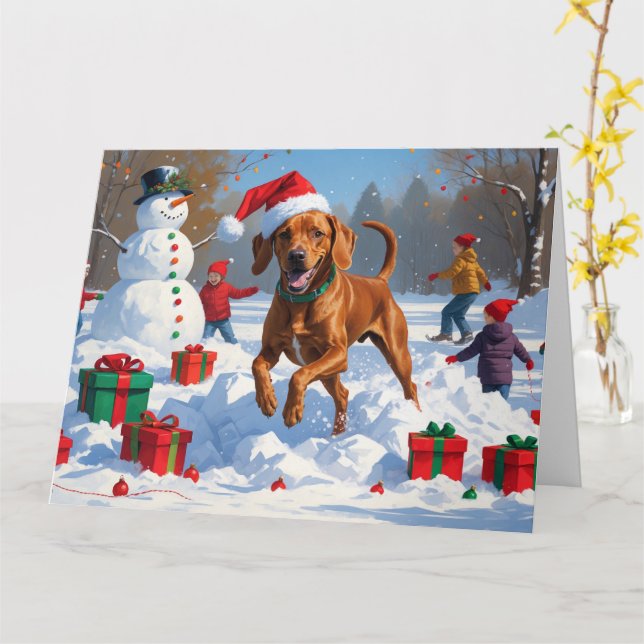 Vizsla Running in Snow with Christmas Hat Card (Yellow Flower)