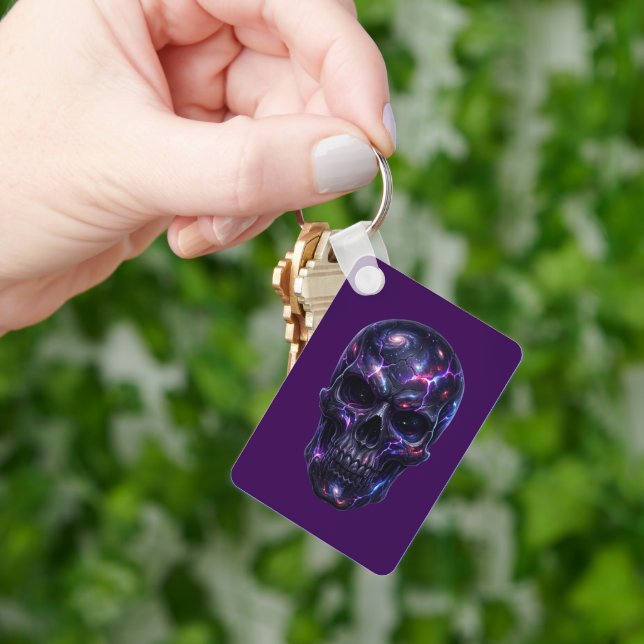 Void‑Carved Cosmic Skull Keychain (Hand)