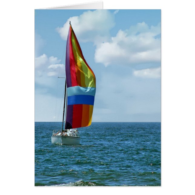 voilier avec spinaker arc-en-ciel sur l'eau (Devant)