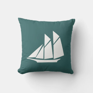 voilier blanc sur coussin gris foncé bleu