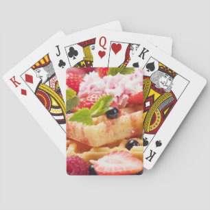Waffle cake with fresh berry fruit playing cards
