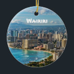 Waikiki Keepsake Ceramic Ornament<br><div class="desc">A unique gift or keepsake for the Hawaiian traveler. The view of Waikiki and Honolulu from iconic Diamond Head Crater. And the Hawaiian Green Sea Turtle sleeping o n Laniakea Beach on the reverse. The Island name and year date is customizable.</div>