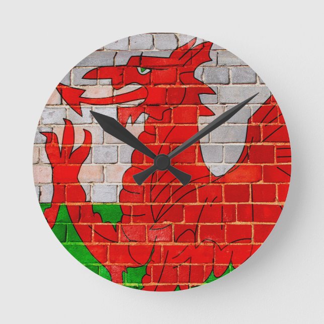 Wales flag on a brick wall round clock (Front)