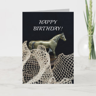 Walking horse in gold metal for a winner birthday card