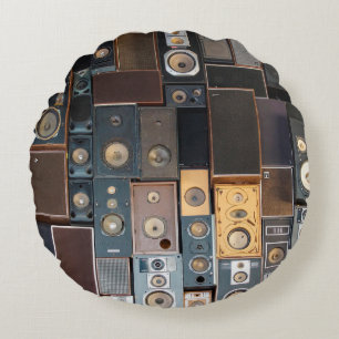 Wall of speakers round pillow