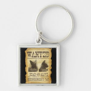 Wanted dead and alive.  Schroedinger's cat. Keychain
