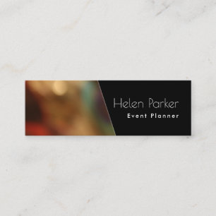 Warm, blurred photo beside solid black diagonal mini business card