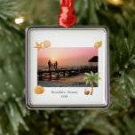 Warmest Wishes Beach Photo Modern Christmas Metal Ornament<br><div class="desc">Modern Christmas ornament featuring a simple and fun design with a starfish,  palm tree,  coconut drink and seashells accenting your favourite beach photo along with optional text.</div>