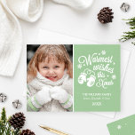 Warmest Wishes This Xmas Green Photo Greeting Holiday Card<br><div class="desc">Send cozy Christmas cheer with this photo holiday card featuring the festive message “Warmest Wishes This Xmas.” A full photo area highlights your favorite image beside playful mittens and snowflakes on a soft green background. Perfect for spreading warmth and joy to family and friends this season.</div>
