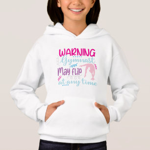 Warning Gymnast May Flip at Any Time