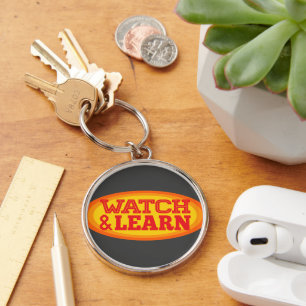 Watch & Learn Radial Oval Keychain