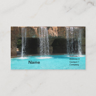 wate cascading by an outdoor cave and pool business card