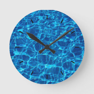WATER. CLEAR BLUE OCEAN WATER WATCH ROUND CLOCK