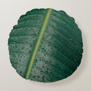 Water droplets on banana leaf round pillow