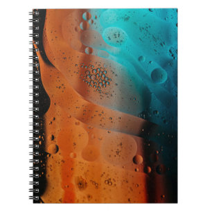 Water droplets on glass panel notebook