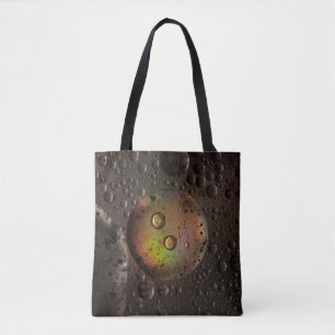 Water droplets on glass panel tote bag