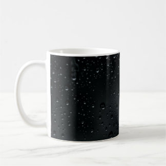 water drops on black window  coffee mug