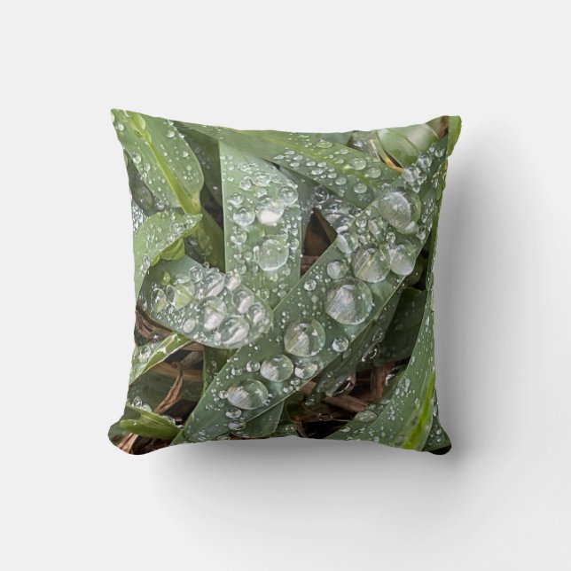 Water drops on grass throw pillow (Front)