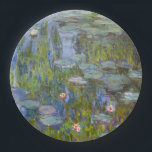 Water Lilies by Claude Monet Classic Impressionist Paper Plate<br><div class="desc">"Water Lilies" (1915) by Claude Monet is a serene painting that showcases his iconic water lily pond, with soft reflections on the water's surface and a tranquil, almost abstract quality. The painting emphasizes the natural beauty of the pond, surrounded by lush greenery, capturing the gentle play of light and colour...</div>