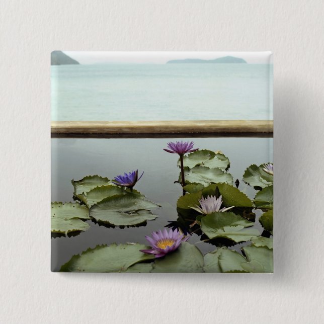 Water lilies in pond by ocean 2 inch square button (Front)
