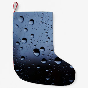 Water on mirror close-up photography small christmas stocking