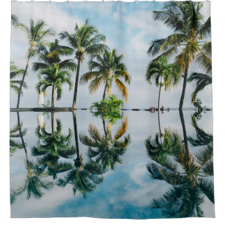 WATER REFLECTION OF COCONUT PALM TREES