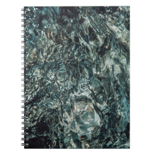 Water splash in close up photography notebook