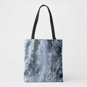 Water splash on white background tote bag