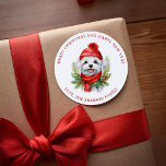 Watercolor Christmas Maltese Dog Classic Round Sticker<br><div class="desc">Sweet watercolor style illustration of an adorable Maltese dog wearing a red scarf and hat on a background of christmas greenery.</div>