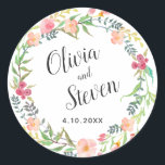 Watercolor Floral Wreath Wedding Classic Round Sticker<br><div class="desc">A lovely boho-inspired watercolor floral wreath surrounds your names and wedding date. The bride and groom's names are shown in a trendy handwritten font style. Edit the text with your names and wedding date or other desired text. These stickers are available in 2 sizes. The smaller size makes a nice...</div>
