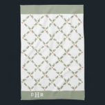 Watercolor Holly Monogrammed Christmas Red Green Kitchen Towel<br><div class="desc">Add an elegant customized touch to holiday home decorations with a monogrammed Christmas kitchen towel. The intiials on this template are simple to personalize or delete. The design features artistic watercolor holly leaves and berries in green and red on a simple white background. With stylish vintage typography monogram and modern...</div>
