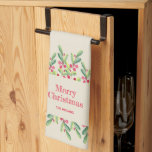 Watercolor Leaves and Berries Christmas Kitchen Towel<br><div class="desc">Stylish watercolor of green leaves and red berries on an ivory background,  Merry Christmas and your family name in chic lettering,  this kitchen towel is a beautiful addition to your Christmas holiday decor. MATCHING items in our collection.</div>