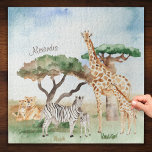 Watercolor Mommy and Baby African Animals Jigsaw Puzzle<br><div class="desc">Add an adorable custom safari theme to your game collection with this pretty watercolor African animal jigsaw puzzle. Puzzle has mommy and baby giraffes, zebras, and lions in an African savannah background. There is also a place for a first name (which may be removed per your preference). Makes a cute...</div>