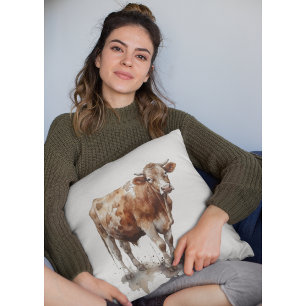 watercolor painting of a cow in a pasture throw pillow