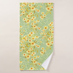 Watercolor picture of daisy flowers on a light gre bath towel