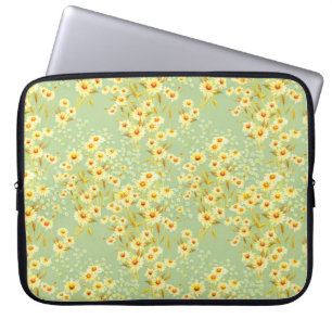 Watercolor picture of daisy flowers on a light gre laptop sleeve