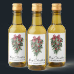 Watercolor Pines Calligraphy Ink Christmas Mini Wine Label<br><div class="desc">Modern Elegant Calligraphy Ink Script Watercolor Pines Winter Greenery with Burgundy Red Ribbon Bow Christmas Ornaments,  Pine Cones and Holly Berries Merry Christmas Mini Wine Bottle Label</div>