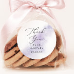 Watercolor Purple Thank You Wedding Favour Sticker<br><div class="desc">These watercolor purple thank you wedding favour stickers are perfect for a modern wedding reception. The simple and classic design features a splash of pastel lavender purple water colour with minimalist elegant style. Personalize the sticker labels with your names, the event (if applicable), and the date. These stickers can be...</div>