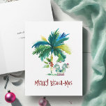 Watercolor Tropical Beach Folded Christmas Cards<br><div class="desc">These tropical beach folded Christmas cards feature an island-inspired exotic palm tree and cute holiday Santa. The words "Merry Beach-mas" are set in hand lettered type. The card opens to reveal a rich berry red colour. Use the template fields to add your personalized greeting. A charming yet funny choice to...</div>