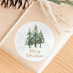 Watercolor Winter Pine Trees Christmas Classic Round Sticker<br><div class="desc">These rustic winter woodland Merry Christmas round stickers are great for envelope seals,  gifts,  and holiday decorating. They feature 3 snow-dusted watercolor pine trees,  with elegant gold Merry Christmas script. Please visit the collection for matching products,  or contact me through Zazzle Chat for design tweaks or more matching products.</div>
